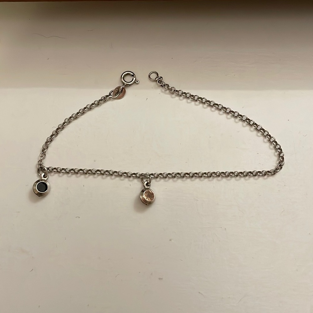 Sterling silver bracelet with 2 charms